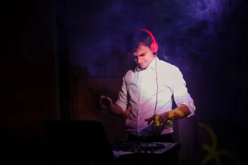 Young and beautiful man DJ